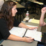 Ashley Arnold reviewing food safety documents
