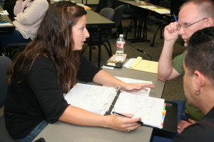 Ashley Arnold reviewing food safety documents