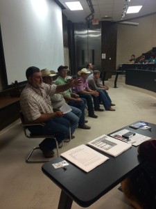Parents discussing commercial steer show contests